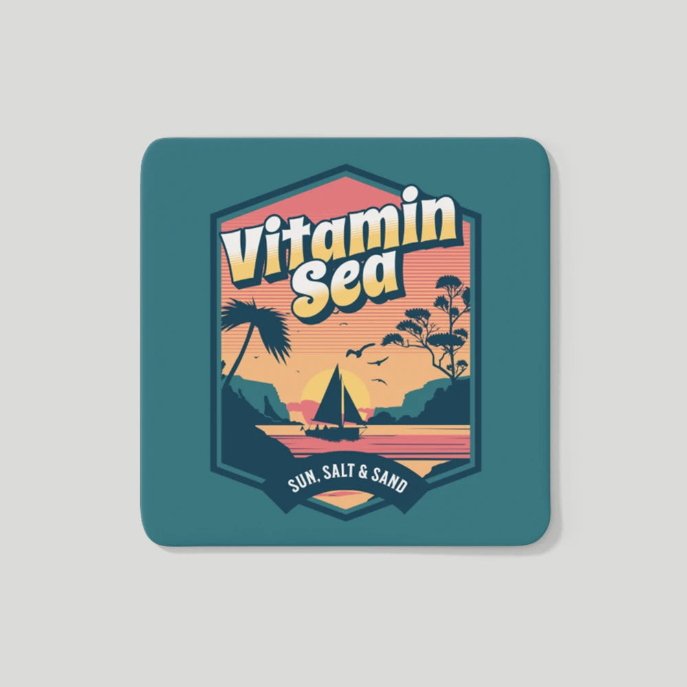 A fridge magnet that promotes the benefits of spending time at the beach, including sun, salt, and sand.